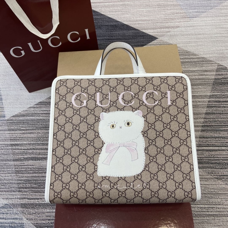 G*u*i shopping bags